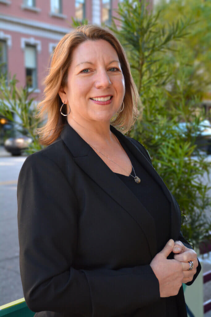 Photo of Lucinda Statler in the parklet on Hampton Street